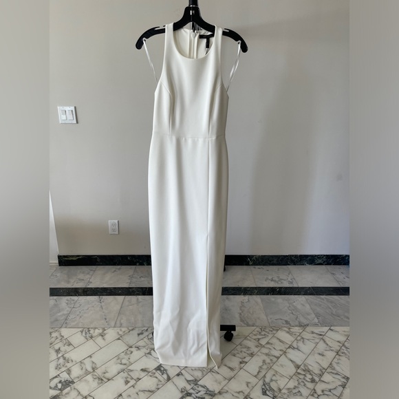 Bcbg woman's white dress. Size 2. New with tags. Never worn! Bcbg woman's white dress. Size 2. New with tags. Never worn!